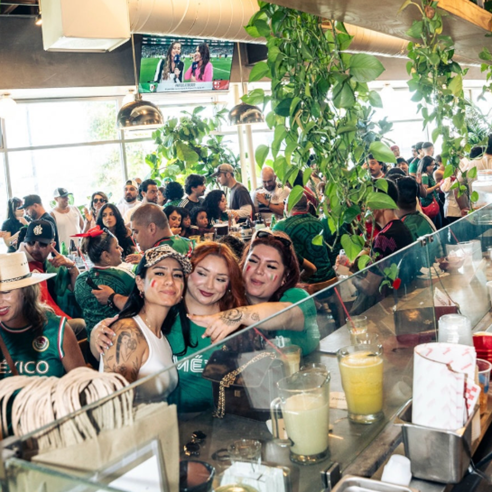Guests gathering inside mothers tacos.